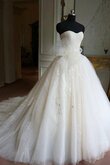 Robe de mariée avec nœud à boucles en tulle appliques de mode de bal manche nulle