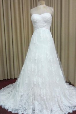 Robe de mariée manche nulle entrecroisé col en forme de cœur avec lacets decoration en fleur