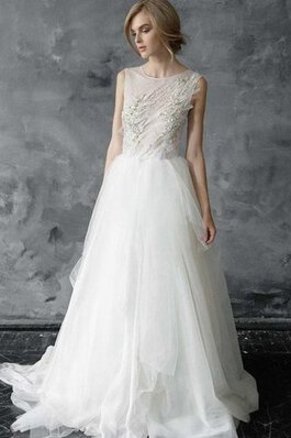 Robe de mariée facile textile en tulle manche nulle broder au niveau de cou