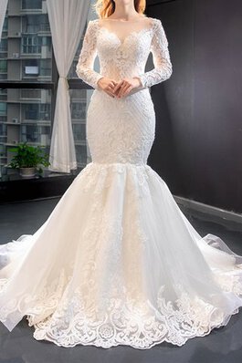 Abito da sposa con perline lungo carina allacciato con maniche lunghe pomposo