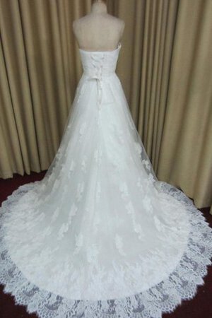 Robe de mariée manche nulle entrecroisé col en forme de cœur avec lacets decoration en fleur - Photo 3